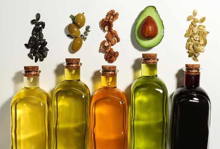 Bottles of assorted seed oils